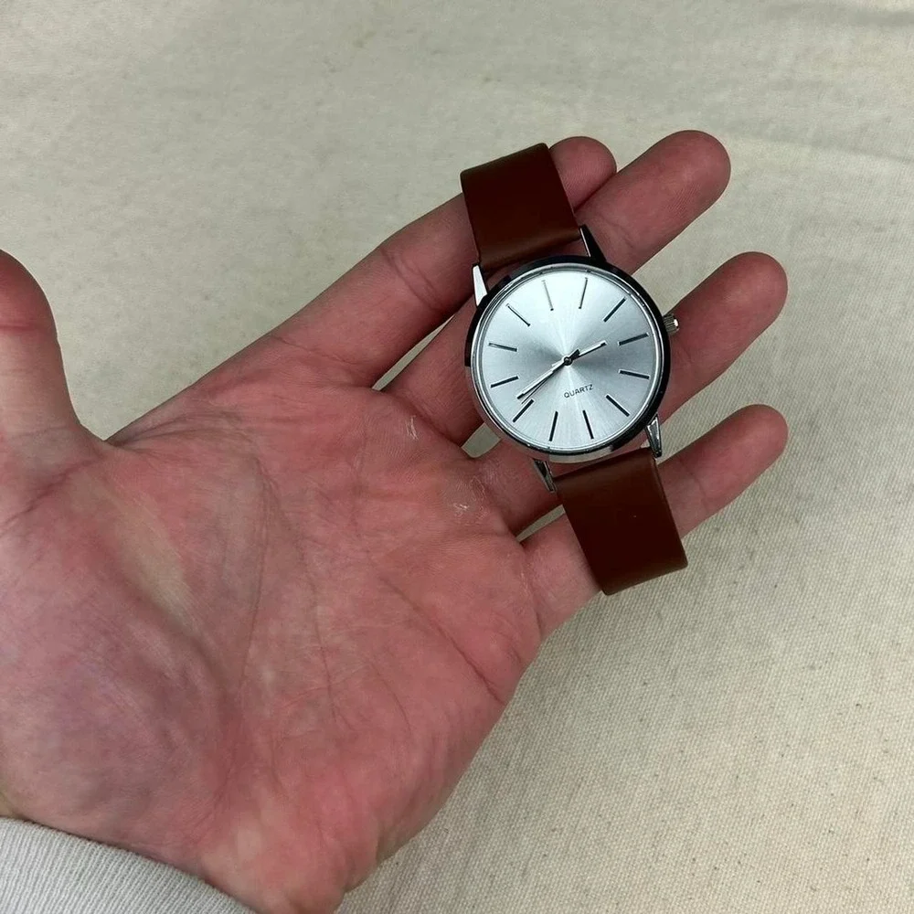 Minimalistic essential vintage style watch stainless steel brown and silver
